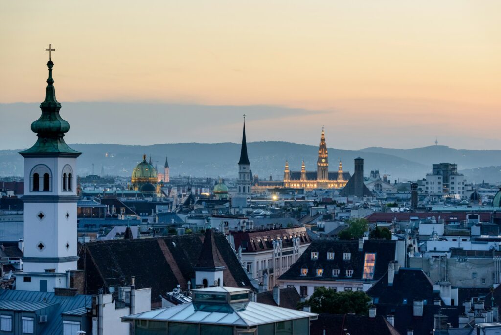 Vienna skyline at sunset with historic rooftops and city center
