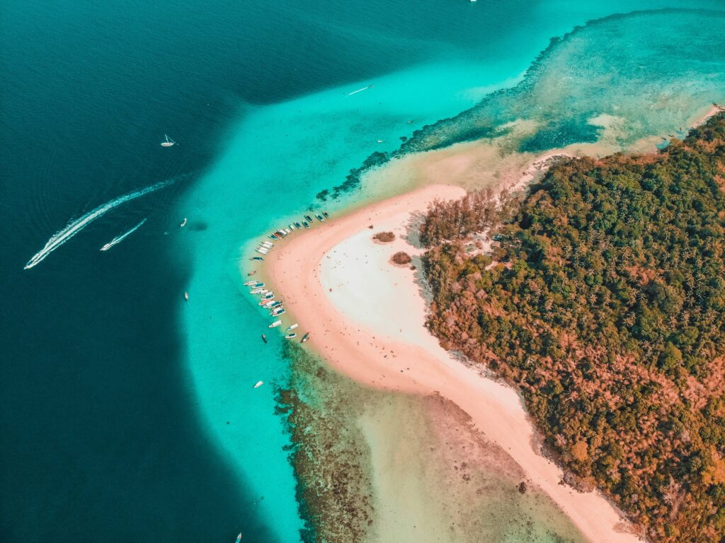 European island with turquoise water and quiet summer beach