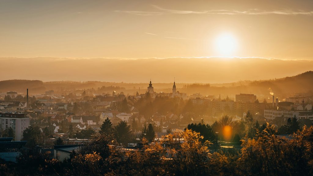 Sunny European city during winter with warm golden sunset